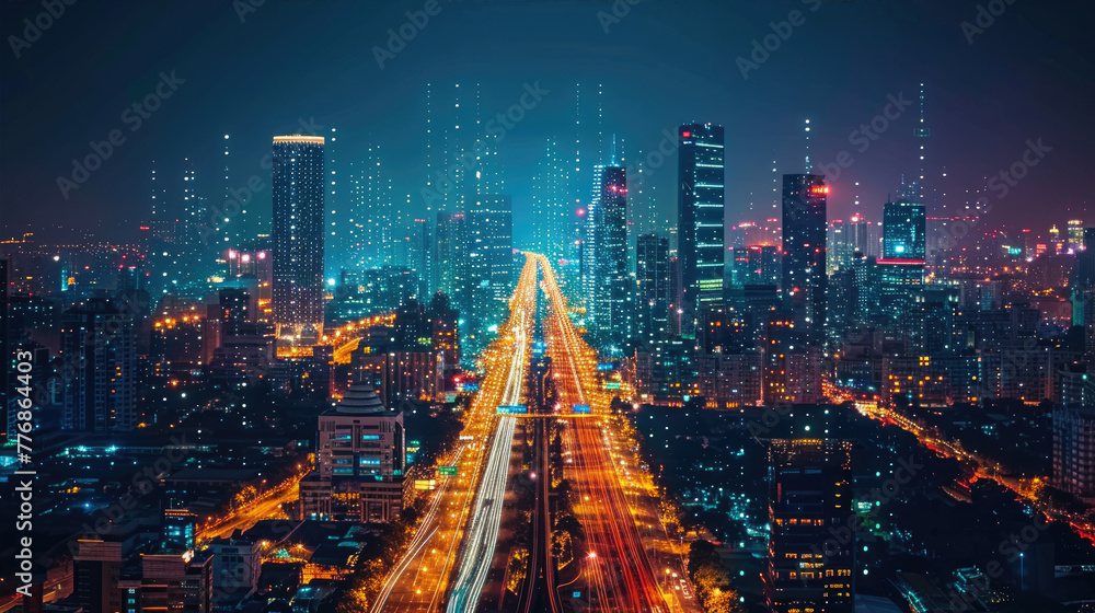 an aerial view of a city at night with lots of buildings and a highway