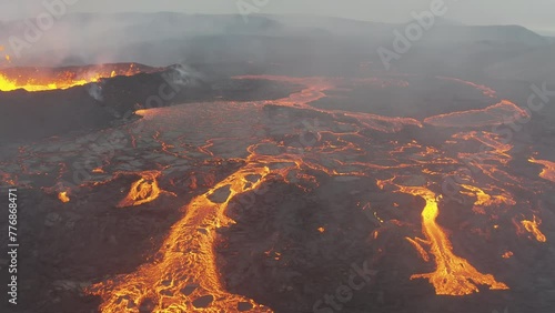 Aerial video of a volcanic eruption, lava and rivers, Litli Harut, Iceland photo