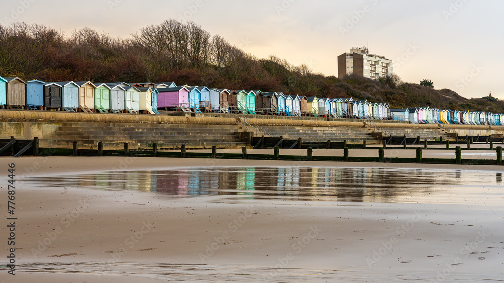 Beach huts on the North Sea coast at Frinton-on-Sea, Essex, England