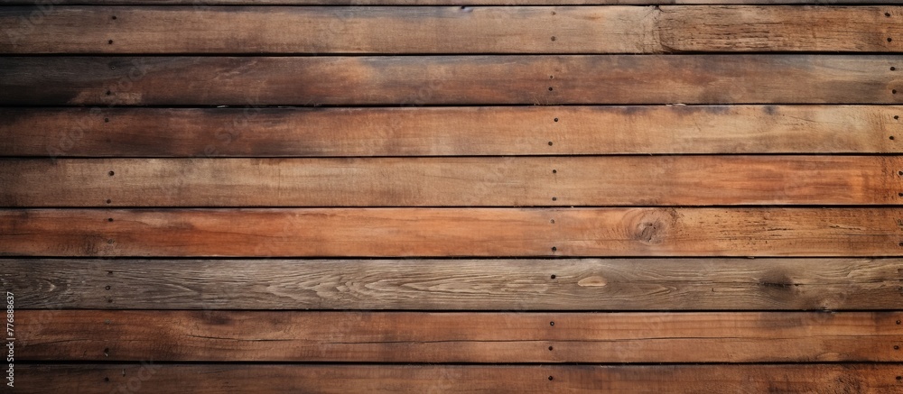 Weathered wooden wall showcasing a multitude of planks in a close-up view, revealing the texture and natural grain of the wood Weathered wooden wall showcasing a multitude of planks in a close-up view, revealing the texture and natural grain of the wood