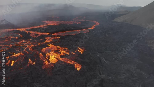 Aerial video of a volcanic eruption, lava and rivers, Litli Harut, Iceland photo