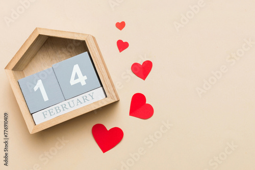 Valentine Day theme with wooden block calendar. Greeting card template for Valentines Day copy space for text