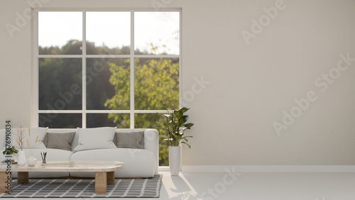 The interior design of a contemporary minimalist white living room features a cozy white couch.