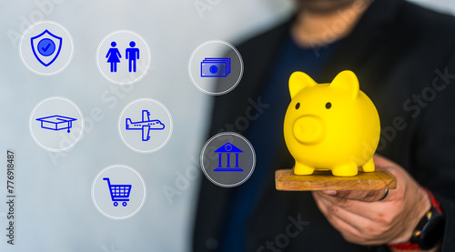 Businessman show the piggy bank with many icon for planning and saving. Family finance plan concept. Saving money