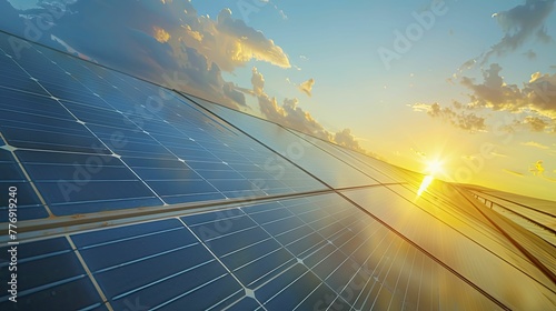 Solar panels with sun reflection in close up, renewable energy theme on light blue background.