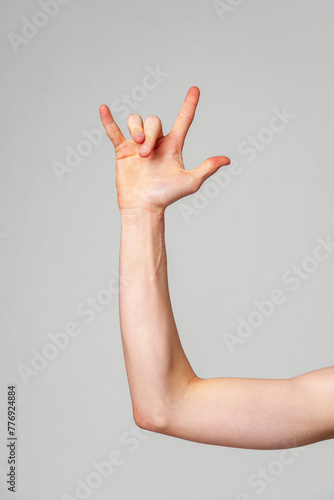 Person With Hand Raised in the Air
