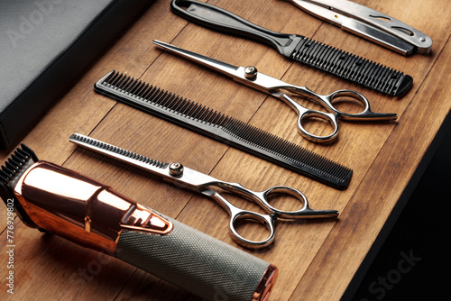 Professional Barber Tools Laid Out on Wooden Surface for Mens Grooming Session