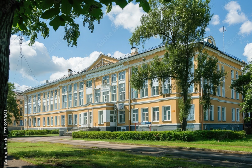 Building of Korolenko school in Sovetskaya street of Noginsk, Russia. Sunny summer view.