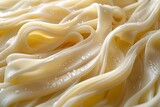 A closeup of white noodles, fresh and delicious.