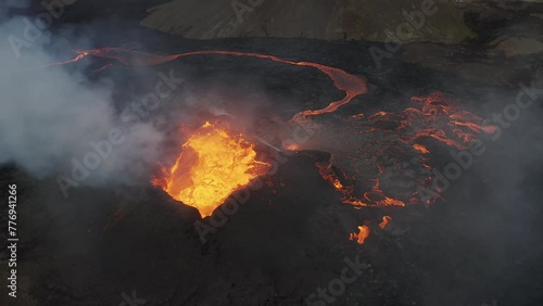 Aerial video of a volcanic eruption, lava and rivers, Litli Harut, Iceland photo