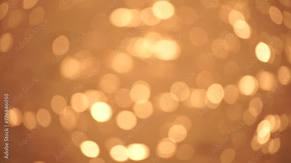 Abstract Blurred video screensaver bokeh golden sea at sunset. The sun reflects and sparkles on the waves. Abstract Blurred video screensaver bokeh golden sea at sunset. The sun reflects and sparkles on the waves.