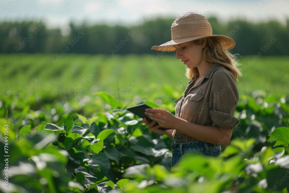 Farmer with tablet in the field . Agriculture, gardening, business or ecology concept. Growth dynamics.  corn/ copy space