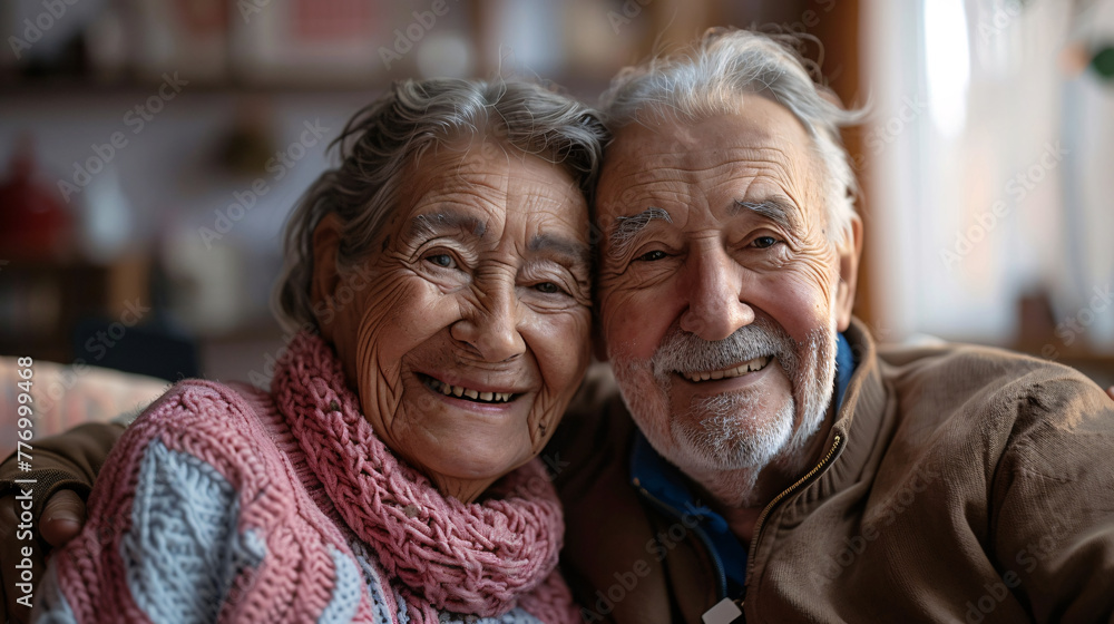 Grandfather and grandma sit smiling on sofa in living room, radiating warmth and happiness. Grandfather and grandma sit smiling on sofa in living room, radiating warmth and happiness.
