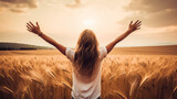 Serene Woman Embracing Sunset in Peaceful Wheat Field