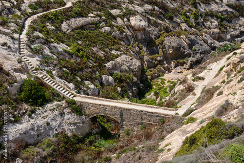 This little pedestrian stone bridge in the Kantra Valley is part of the Heritage Trail - Xlendi, Malta photo