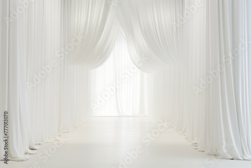 Bright white curtains fluttering by window