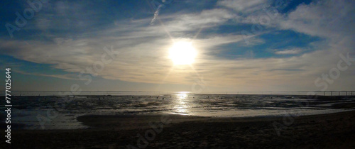 backlight on a beach in Arcachon, a famous seaside resort, located on the Atlantic coast in New Aquitaine, in the Bordeaux region