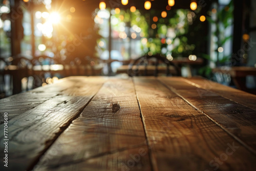 A closeup of a wooden table inside a restaurant
