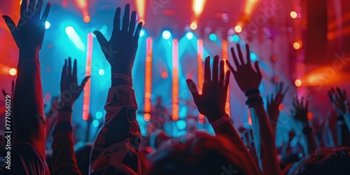 People at a concert waving ...