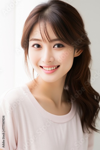 a Japanese woman's radiant smile in a meticulously crafted stock photo, embodying the epitome of professionalism. She is wearing white - pink pastel color on white background.