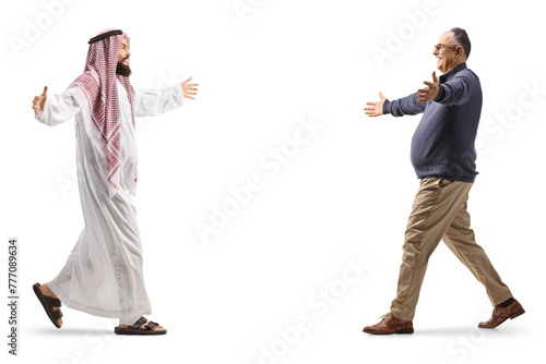 Full length profile shot of a saudi arab man meeting a friend