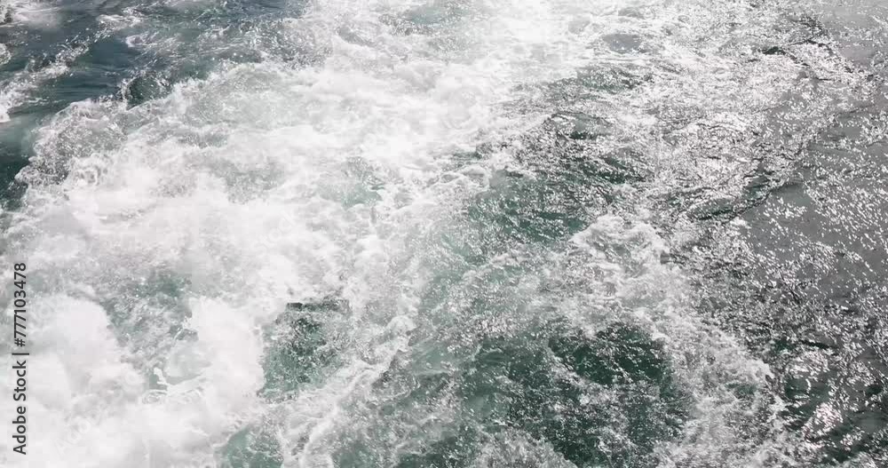 Water with waves in sea behind motorboat or speedboat 4k movie slow motion. Sea travel concept Water with waves in sea behind motorboat or speedboat 4k movie slow motion. Sea travel concept