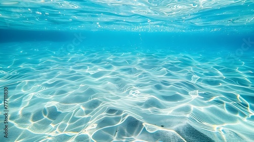 Photo of clear blue water, with light ripples and small waves on the surface, in shallow waters, with a view from above, looking down at the bottomless ocean. photo