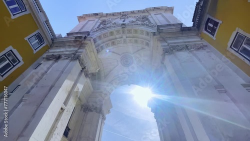 Rua Augusta Arch in Lisbon Portugal with blue sky from below 