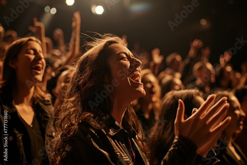 Joyful Audience Member Clapping at Live Event