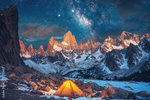 Illuminated tent under a starry sky in a snowy mountain range. Generative AI image photo