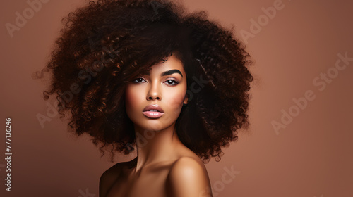 Beautiful african american girl with an afro curly hairstyle.