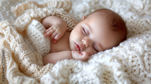 A baby sleeps peacefully wr...