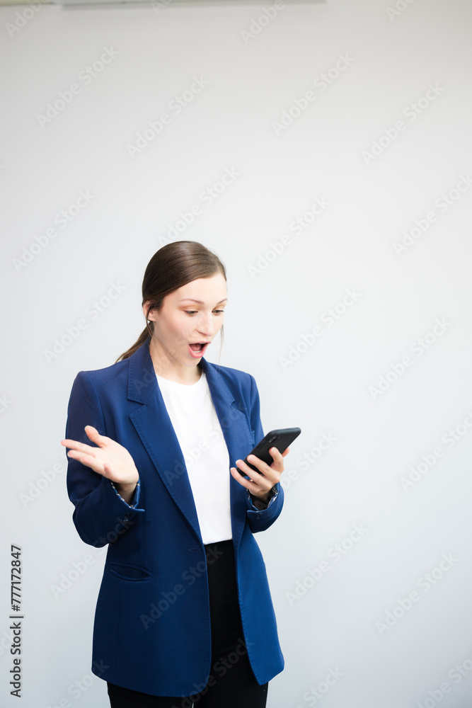 Confident Caucasian businesswoman CEO idea holding tablet and laptop for remote work, online viewing, multitasking isolated Confident Caucasian businesswoman CEO idea holding tablet and laptop for remote work, online viewing, multitasking isolated