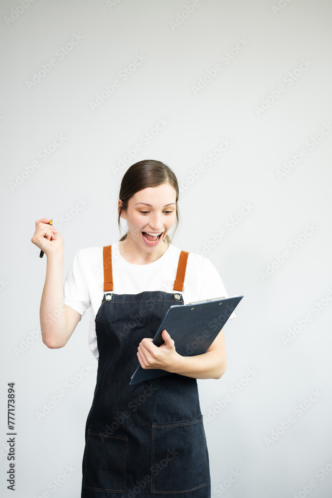 Woman entrepreneur or shop owner. Isolated small business owner or barista with apron on white background. Woman entrepreneur or shop owner. Isolated small business owner or barista with apron on white background.