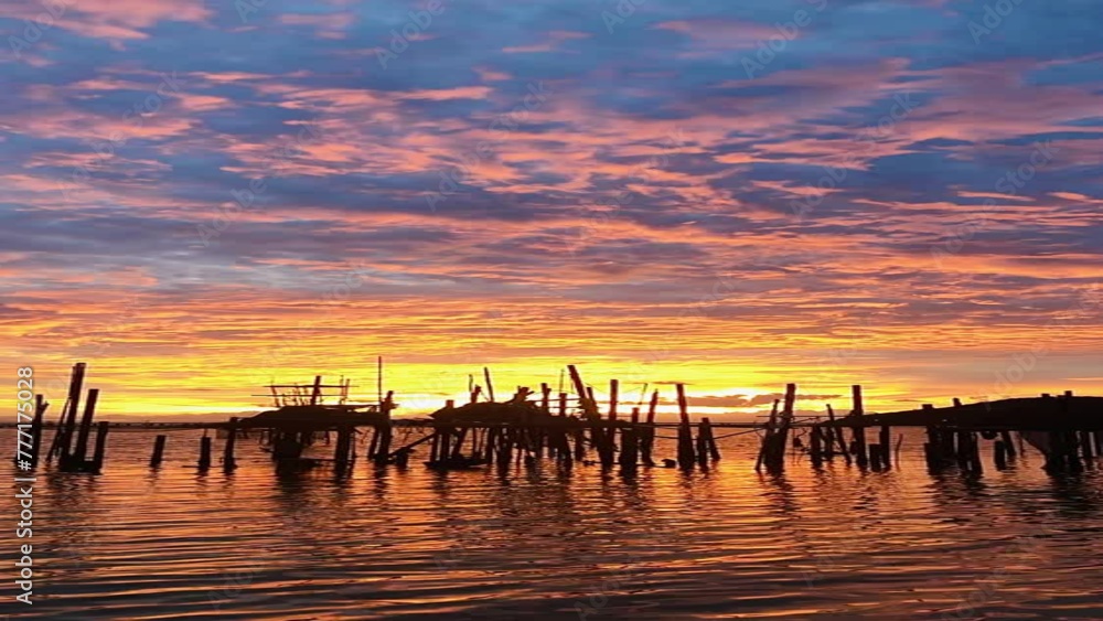 Sunset sky in evening on beach and bright light reflect the sea, beautiful sunset and colorful clouds Sunset sky in evening on beach and bright light reflect the sea, beautiful sunset and colorful clouds
