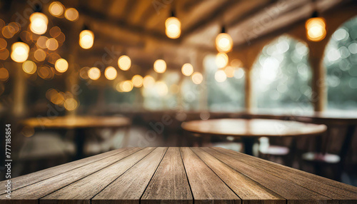 Empty wooden table with blur rustic bar restaurant cafe background