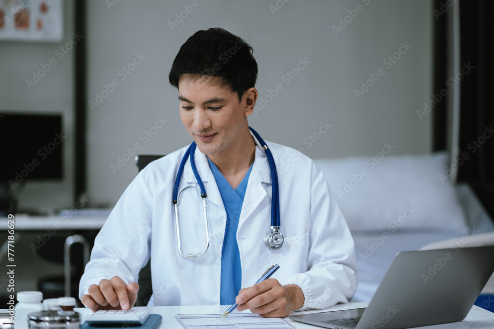 Doctor physician with stethoscope calculate medical fee costs, revenue. practitioner use calculator at Clinic. Doctor physician with stethoscope calculate medical fee costs, revenue. practitioner use calculator at Clinic.