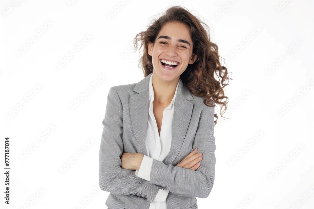 Joyful businesswoman in grey suit standing with crossed arms. Joyful businesswoman in grey suit standing with crossed arms.