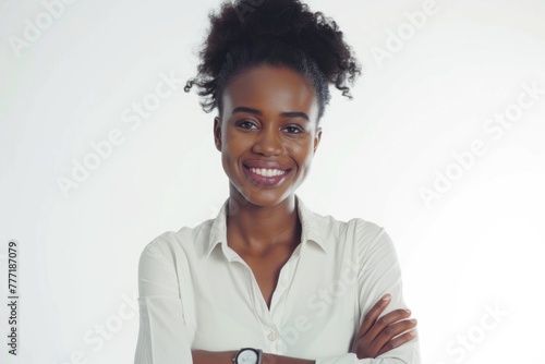 Happy successful African American businesswoman smiling confidently.