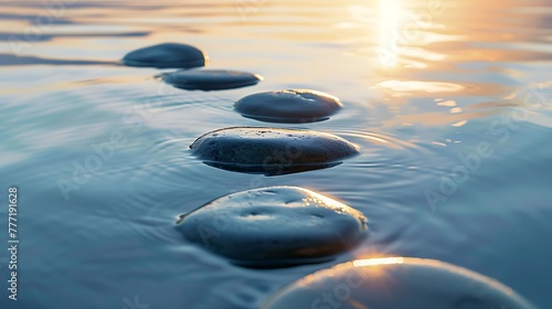 Stones in calm water with evening sun