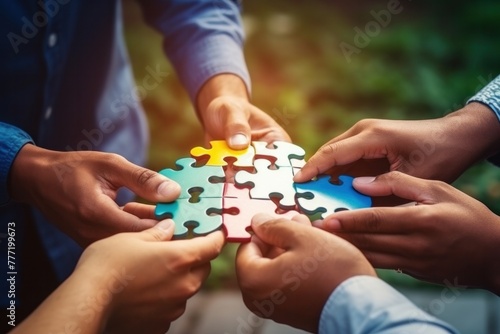 Team building success and hand holding a jigsaw puzzle, concept for teamwork building success.