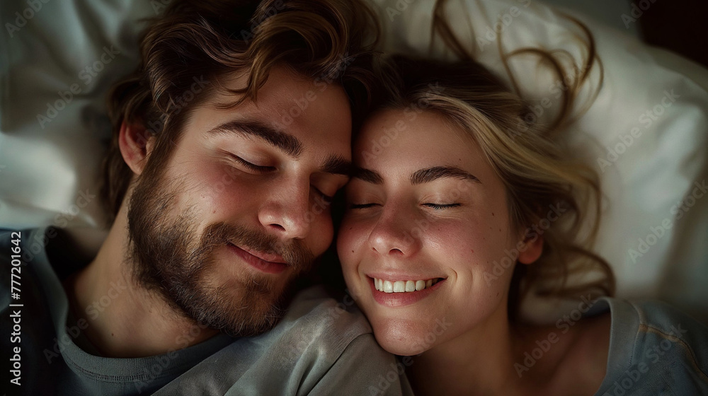 Content white couple snuggling in bed, eyes closed, smiling. Content white couple snuggling in bed, eyes closed, smiling.