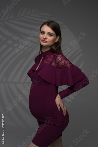 portrait of a pregnant woman in dress