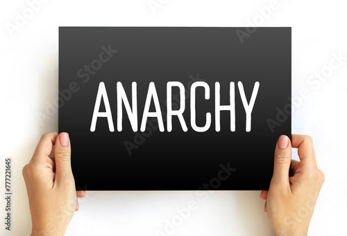 Anarchy - society being freely constituted without authorities or a governing body, text concept on card photo