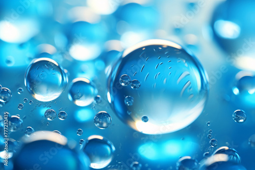 A group of blue bubbles float on top of the blue liquid 