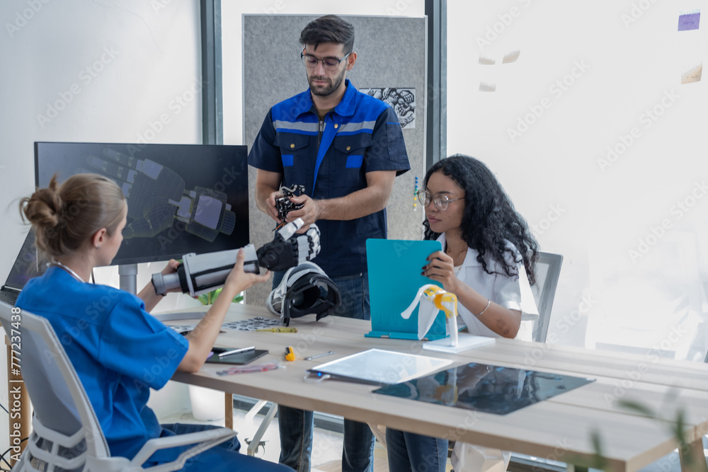 Obraz premium Innovative team including engineer, doctor and surgeon design robotic limbs for patient rehab.