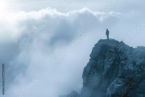 man of the top of the mountain in the fog