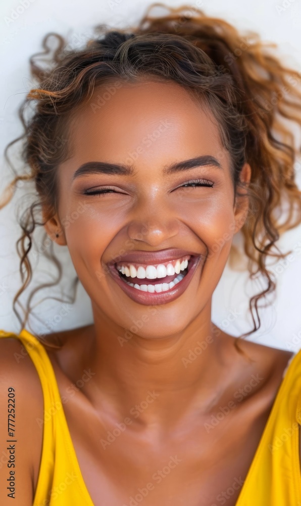 Woman Smiling and Wearing a Yellow Top Woman Smiling and Wearing a Yellow Top