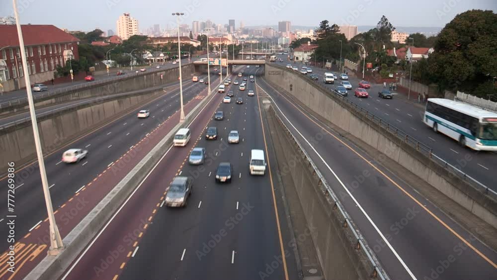 High-speed traffic on the N3 freeway seamlessly moving between Durban's city center and surrounding areas, South Africa. High-speed traffic on the N3 freeway seamlessly moving between Durban's city center and surrounding areas, South Africa.