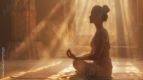Indian woman engages in a serene yoga practice photo